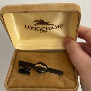 Longchamp Black Tie Bar with Gold Horse Emblem